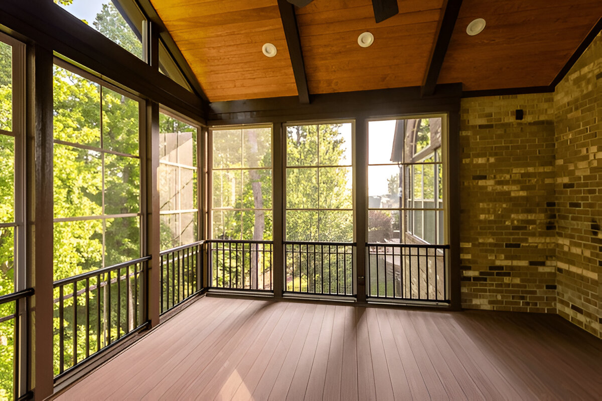 Screened-in sunroom with vaulted wood ceiling and large windows