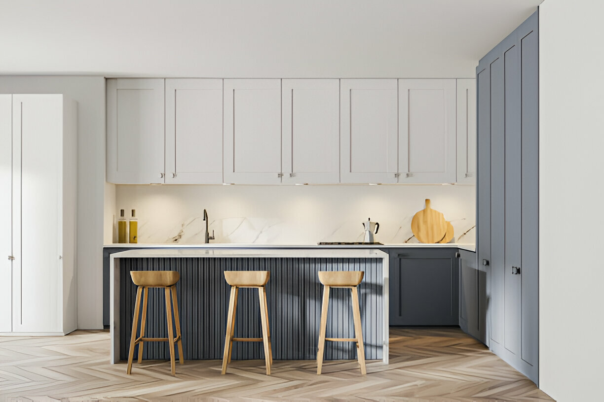 Modern kitchen with light cabinets and a dark island