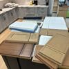 Two-tone navy blue and white kitchen cabinets with quartz countertop — 2026 trending cabinet colors South Jersey