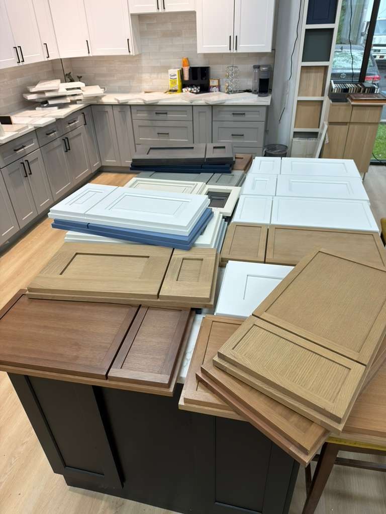 The Kitchen Cabinet Colors Taking Over South Jersey Homes in 2026 (And What's Finally Out) 1 Two-tone navy blue and white kitchen cabinets with quartz countertop trending 2026 South Jersey MDC Design Center